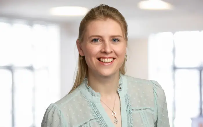 A photo of Holly Hill, senior associate at John Lamb Hill Oldridge.